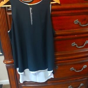 Black and Cream Colored Sleeveless Blouse Reversible
